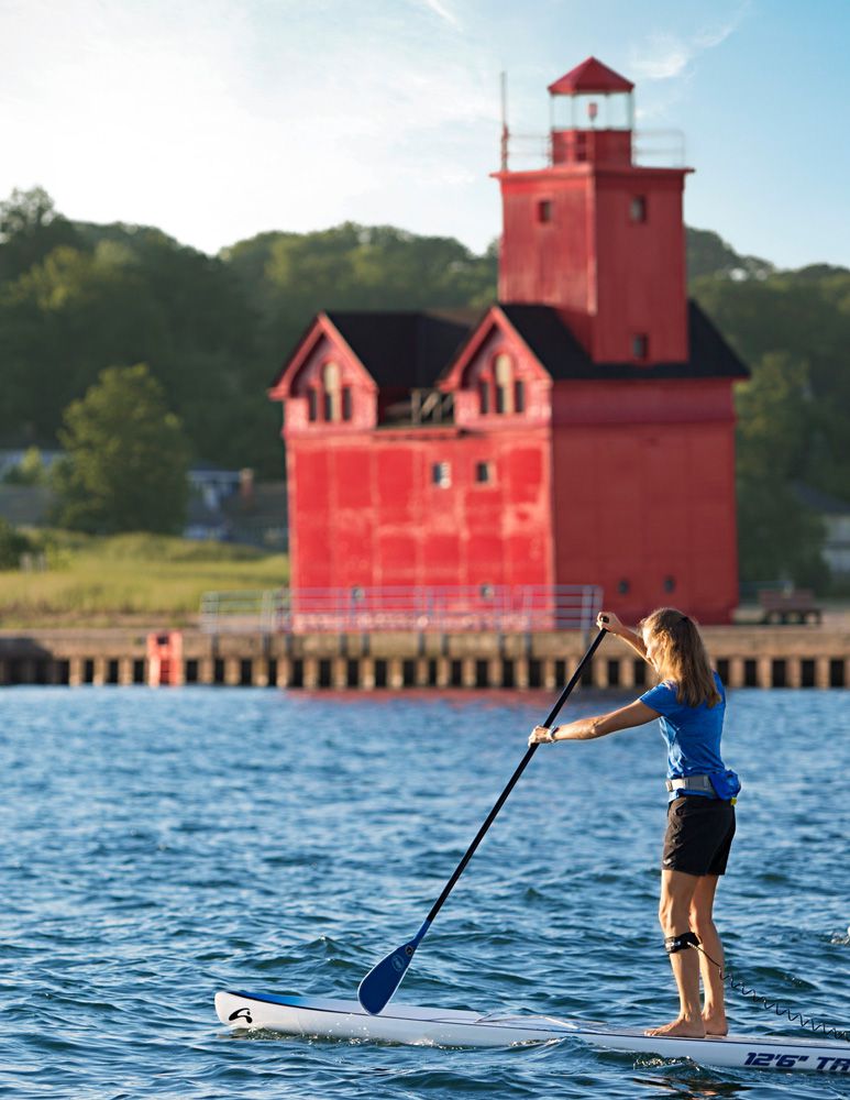 Paddling the channel. Big Red, Holland State Park beach.