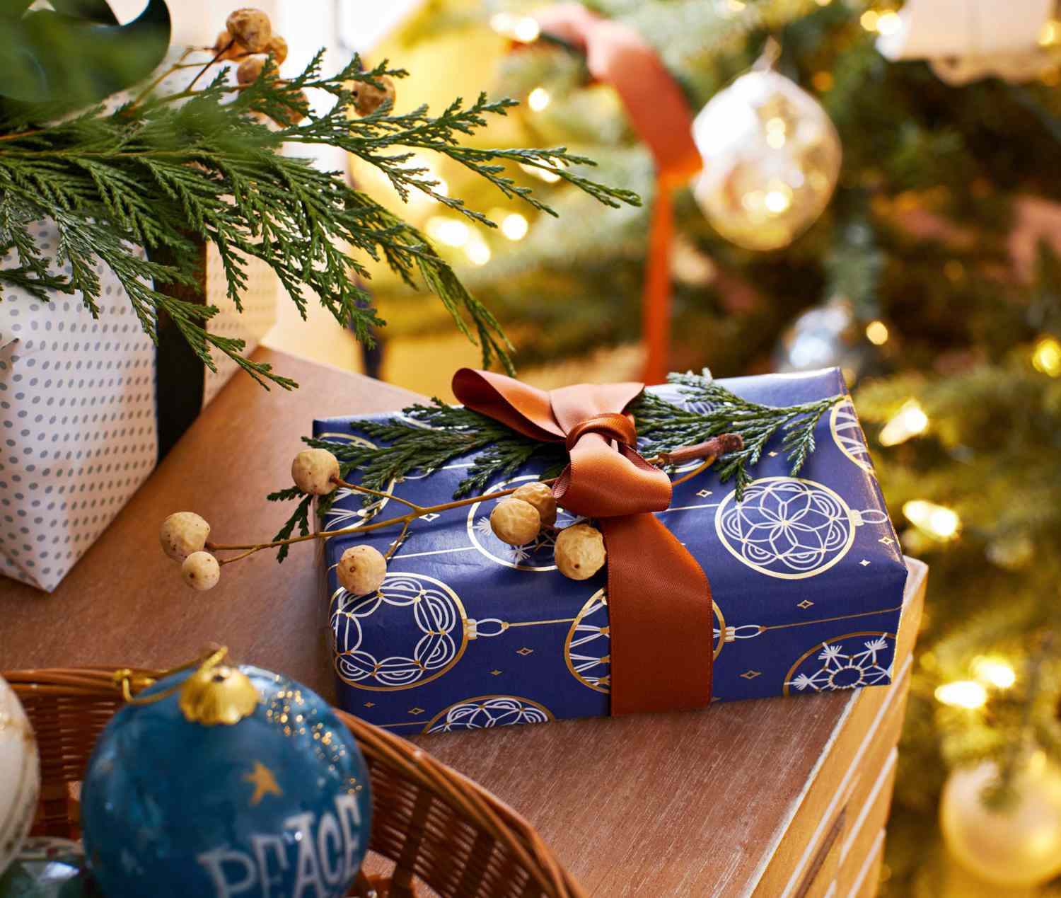 Holiday gift wrapped in blue paper