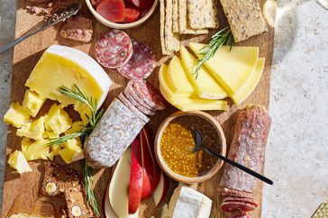 Cheese board with a variety of cheese and meat products