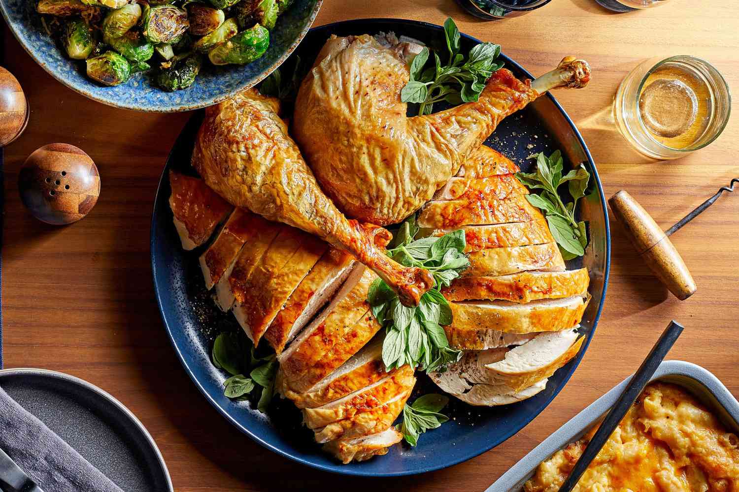 Thanksgiving table with turkey and side dishes