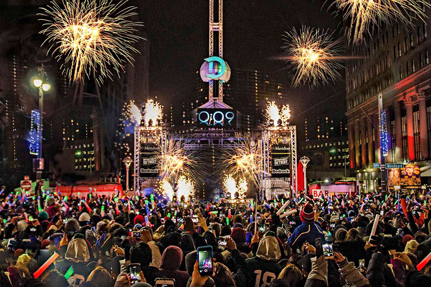 A lighted D drops at midnight on New Year's Eve in Detroit before crowds of spectators